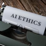 Máquina de escrever retrô com uma folha exibindo a expressão “AI Ethics” (ética em inteligência artificial).